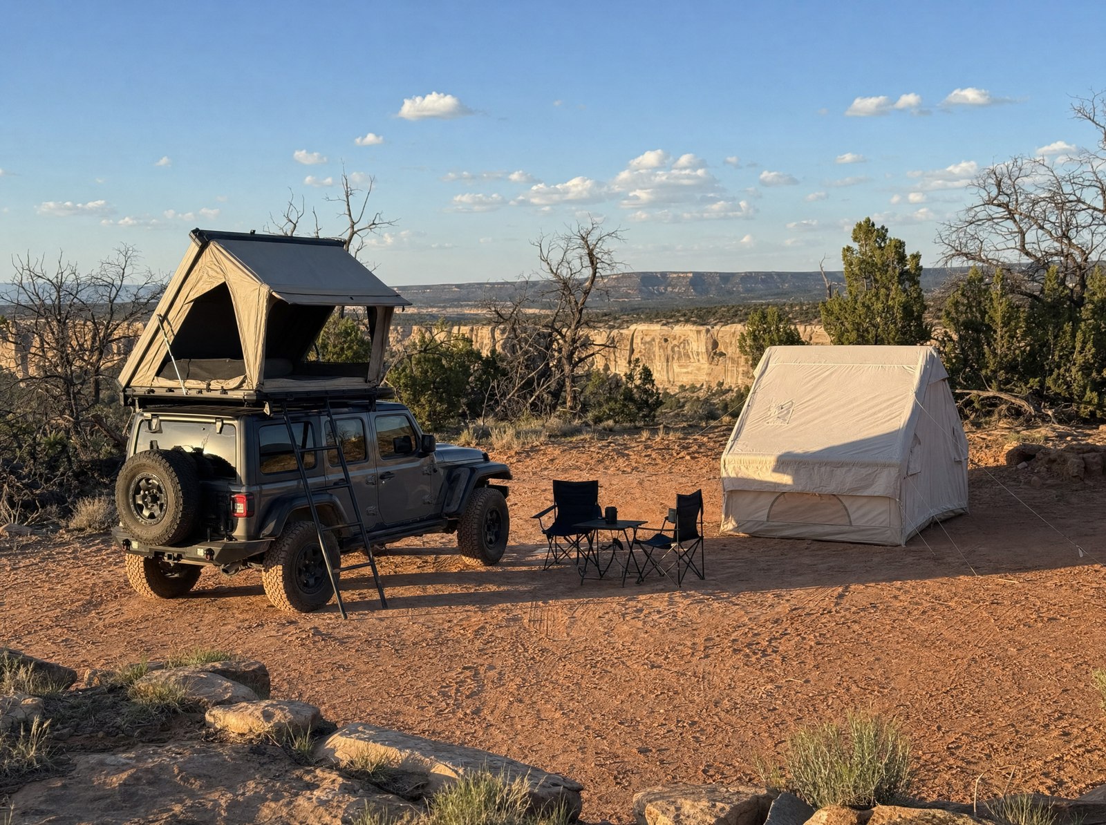 Rooftop tent and canvas tent campsite